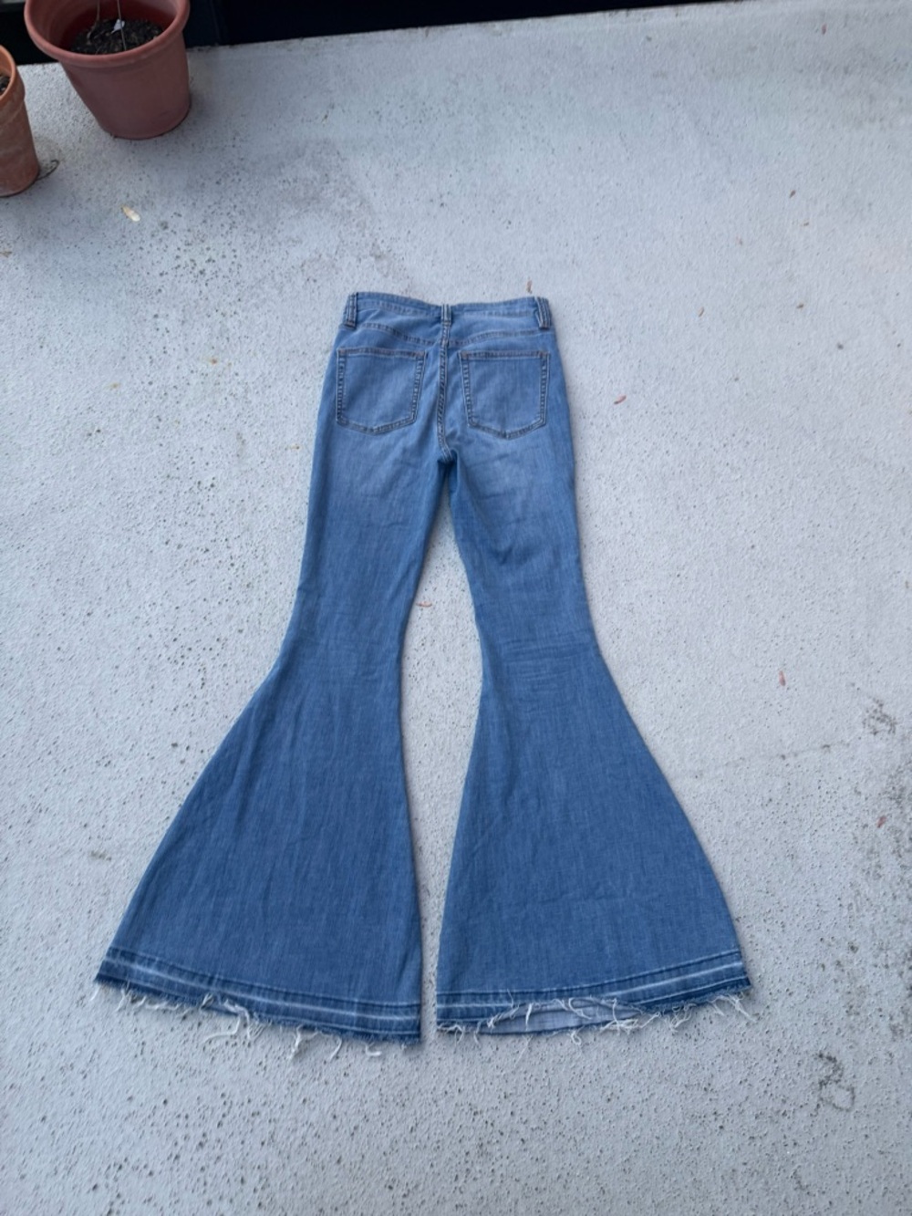 We The Free Medium Blue Flare Jeans with Raw Hem Size 28